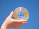 Compact Disc CD on Blue Background