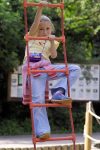 Young Girl on Robe Ladder